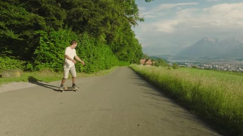 Man on a Skateboard in rural Switzerland