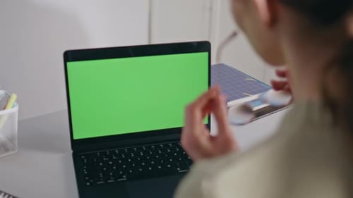 Lady Teacher Looking Greenscreen Laptop in School Office Closeup Online Lesson