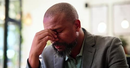 Stress, frustrated and business black man in office with debt problem, bad news