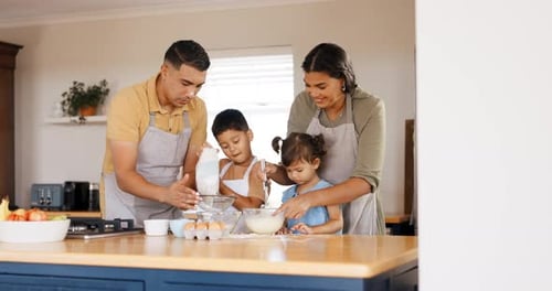 Family Baking Together in Sunny Kitchen
