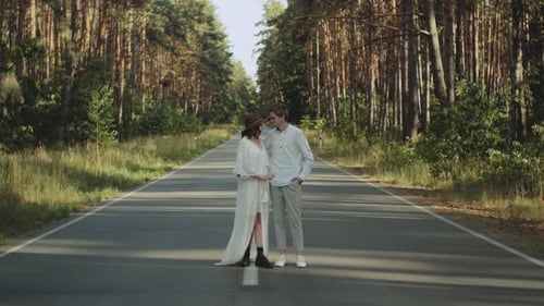 Beautiful Couple in Love Walk in Beautiful Place Hold Hands Man and Woman Hugging and Enjoying