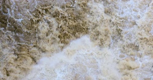 Dynamic CloseUp of Rushing Waterfall with Turbulent Flow
