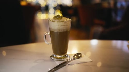 Delicious Coffee Drink with Whipped Cream at Cafe