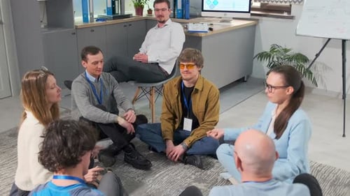 Mindfulness Session Description Coach Guides Breathing Exercise in Peaceful Office Environment with