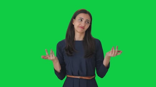 Confused Indian girl asking what questions Green screen