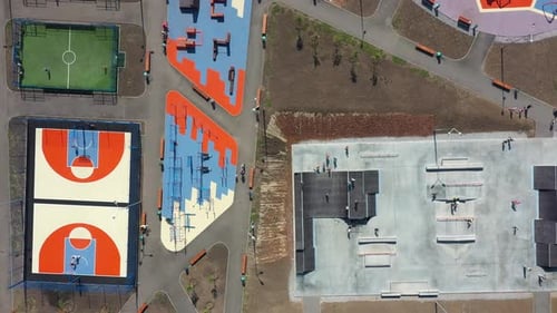 Aerial View on Different Modern Sport Grounds at Urban Park Youth Teenagers and Children Engaging in