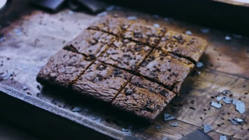 Chocolate Brownies Arranged on a Square Wooden Tray