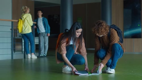 Caucasian Woman Girl Female Schoolgirl Student Dropped Books Fell on Floor in School Academy
