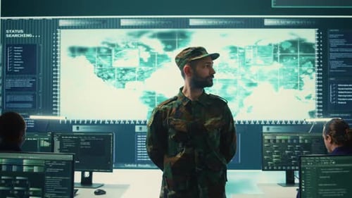 Man Addresses Team in Futuristic Control Center