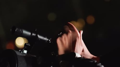 Meticulous Teamwork Calibrating Telescope Focus Near City Lights Dedicated Hands Assembling and