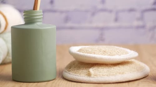 Bathroom Still Life with Decorative Diffuser and Loofahs