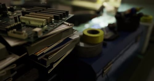 Circuit Boards and Tools on a Workbench During a Late Night Electronics Project