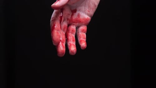 Hand Covered in Realistic Blood Dripping