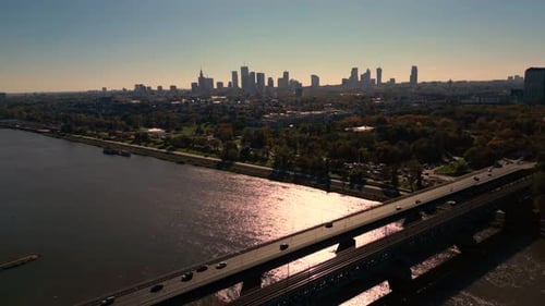 Beautiful aerial footage during the sunset on a Vistula's boulevards, Gdanski's bridge and city skyl