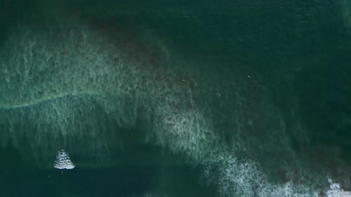 Surfers in Bali - Indonesia.