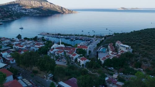 Aerial Video of Seaside Town and Blue Sea During Sunrise