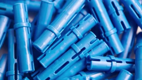 Close Up of Pile of Blue Plastic Tubes