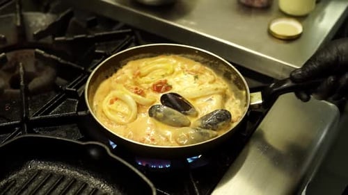Delicious Seafood Mix with Shrimp and Calamari Cooking