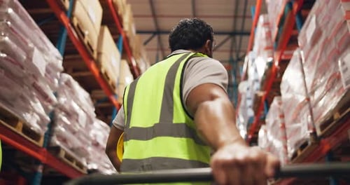 Trolley, handle and hand of logistics worker in warehouse for cargo, industrial or freight delivery