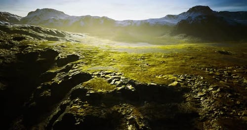Majestic Mountain Landscape Bathed in Golden Sunlight During Dawn Hours