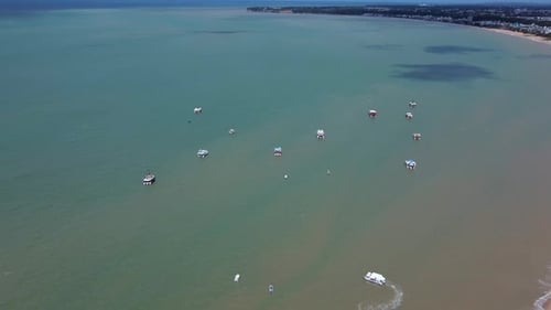 Aerial View Of Boats Moored On The Ocean In Brazil - Drone Shot