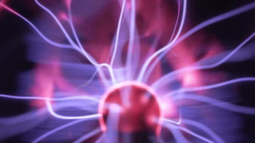Plasma globe in slow motion. Blue and purple light beams, energy rays and pulsating light spheres sl