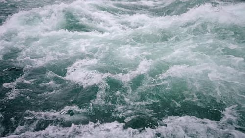 Slow Motion of Wild Clear Mountain River Stream Flowing Through Rocks