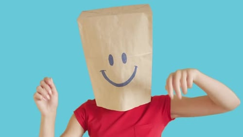 Person Dancing With Paper Bag Over Head