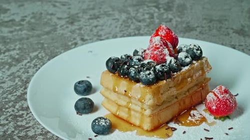 Waffle Tower with Blueberries, Strawberries, and Syrup
