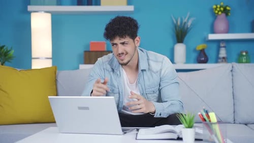 Young Adult Video Conferencing at Home