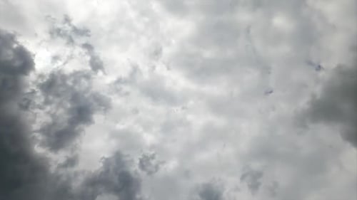 Dramatic Clouds Moving Across the Blue Sky