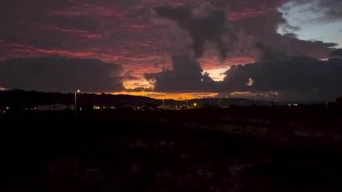 Sunset Over Urban Cityscape at Twilight