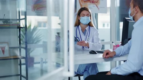 In Hospital Young Woman Doctor with Medical Mask Explain Xray Chest Result Speaking with Illness Man