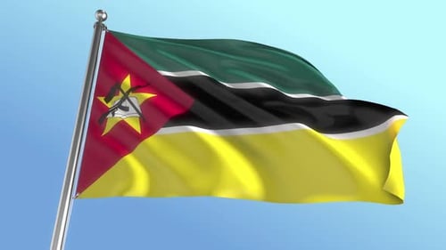 Mozambique Flag Waving Against Clear Blue Sky