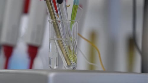 Yellow Liquid Added to Beaker in Lab