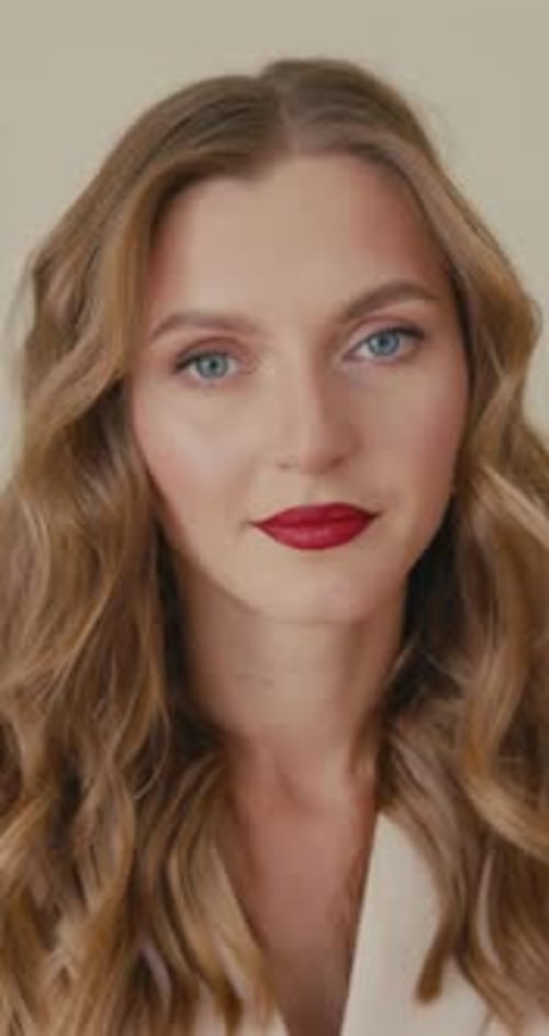 Attractive Young Woman Portrait with Red Lipstick and Blazer