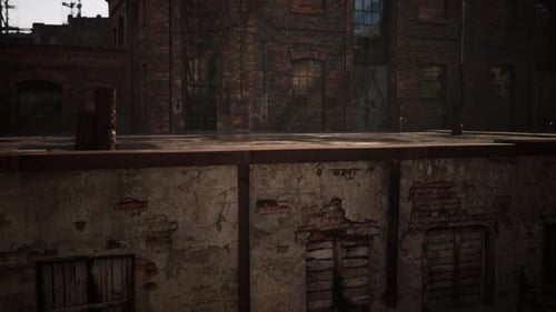 Abandoned Collapsing Factory Surrounded By Old Brick Buildings in Decay