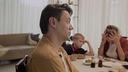 Family Argument Around Dining Table