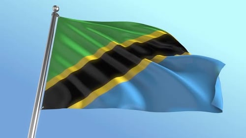Realistic Waving Flag of Tanzania Against Blue Sky
