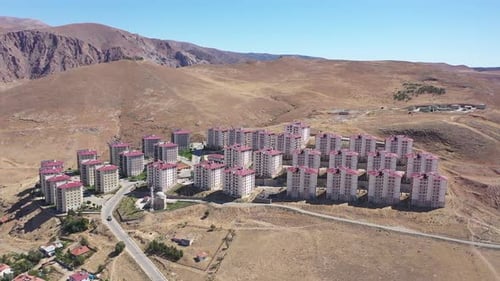 Aerial View Of Mountain And Apartment Buildings