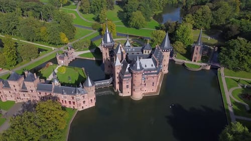 Top view of the largest castle in the Netherlands, De Haar. Quadcopter flight over the castle