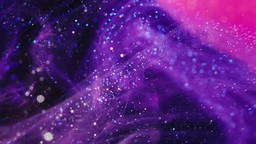 Real Ink Swirl with Sparkling Particles on Black Background