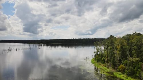 Cloud Reflections Over Tranquil Lake. Aerial Drone Shot