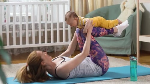 Mother Doing Fitness with Her Baby