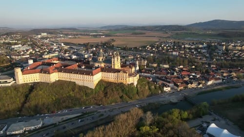 AERIAL VIEW. Melk Abbey overlooking the Danube River. Melk, Lower Austria, Austria