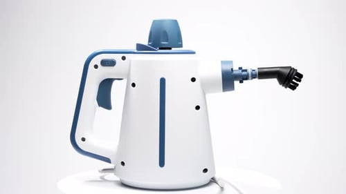 Full view of the handheld steam cleaner with an ergonomic handle and brush nozzle.