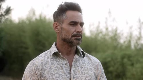 Portrait of Mature Man Standing in Nature Forest Breathing Fresh Air Contemplating Nature at Dusk