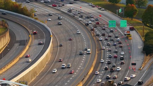 Urban Scene with Driving Traffic on Elevated Interstate Road in Atlanta Georgia USA American Highway