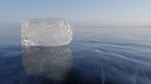 Piece of Ice on Lake Baikal at Sunset