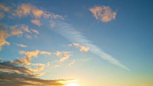 Blue Sky and Clouds at Golden Sunset